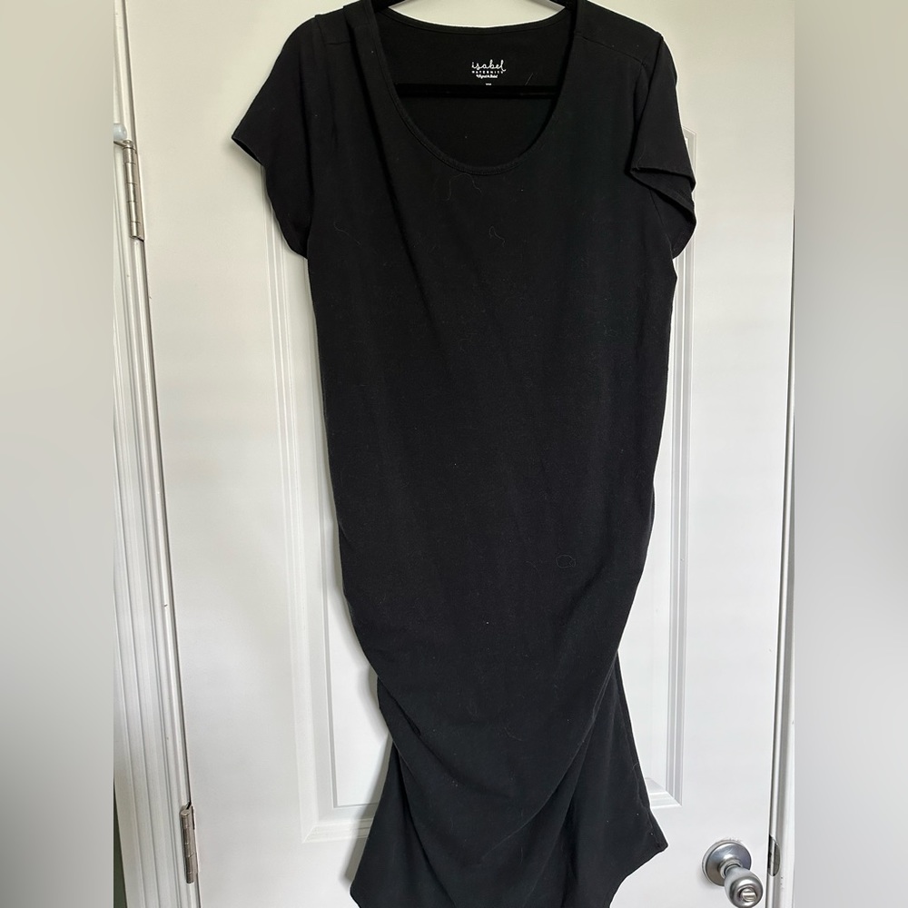 Black fitted maternity dress.